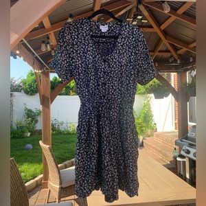 S.Roberts 90s black romper with white rose print